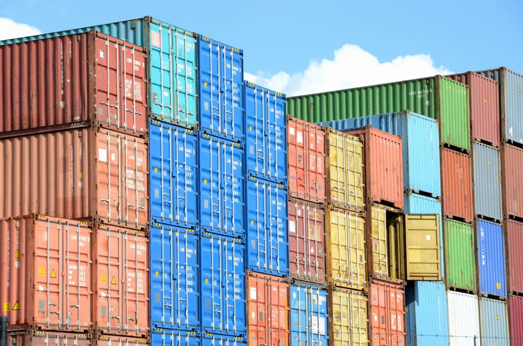 Predicting out-terminals for imported containers at seaports using machine learning: Incorporating unstructured data and measuring operational costs due to misclassifications Image
